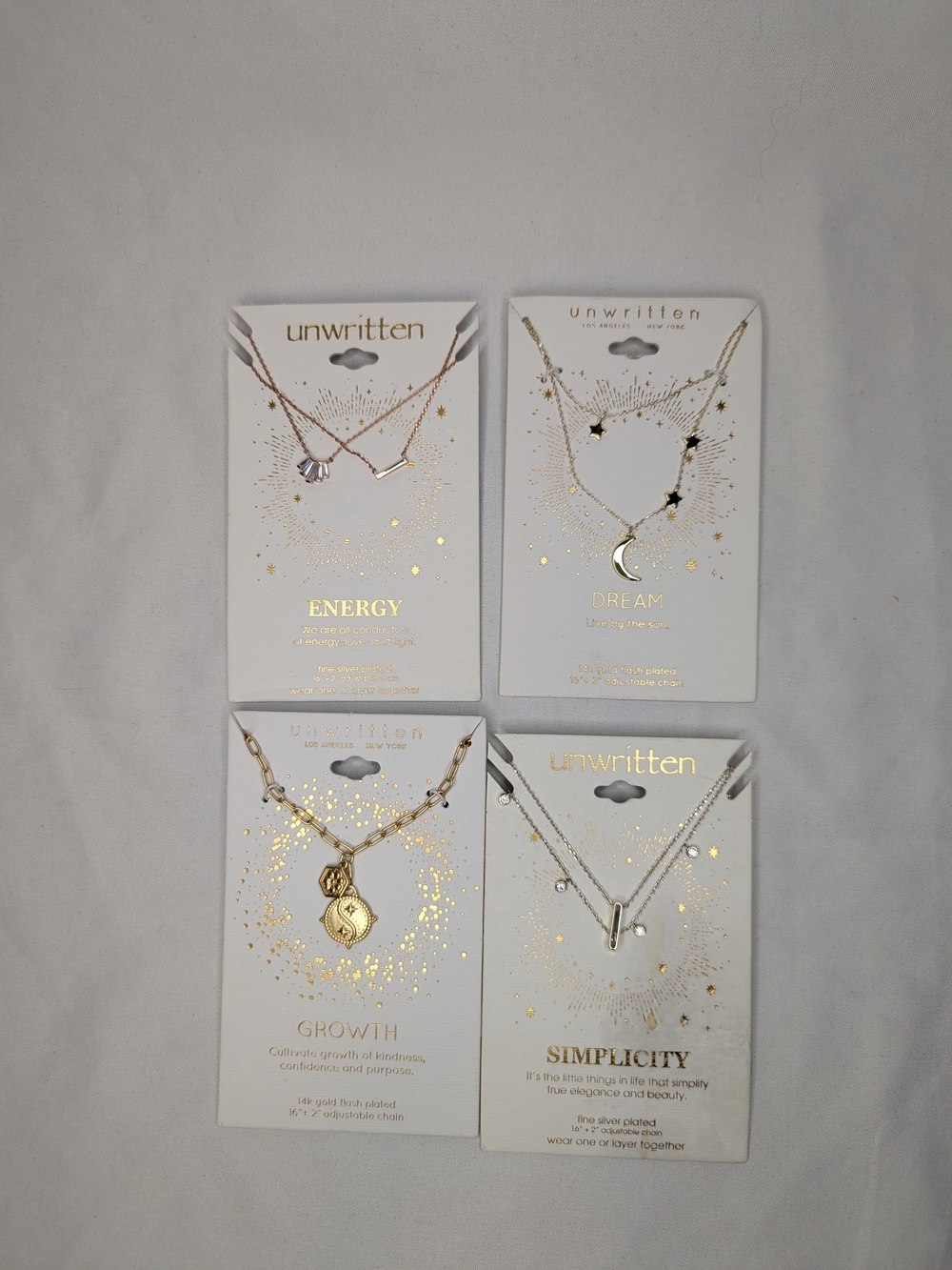 Unwritten Gold, Rose Gold, And Silver Layered Necklace Collection